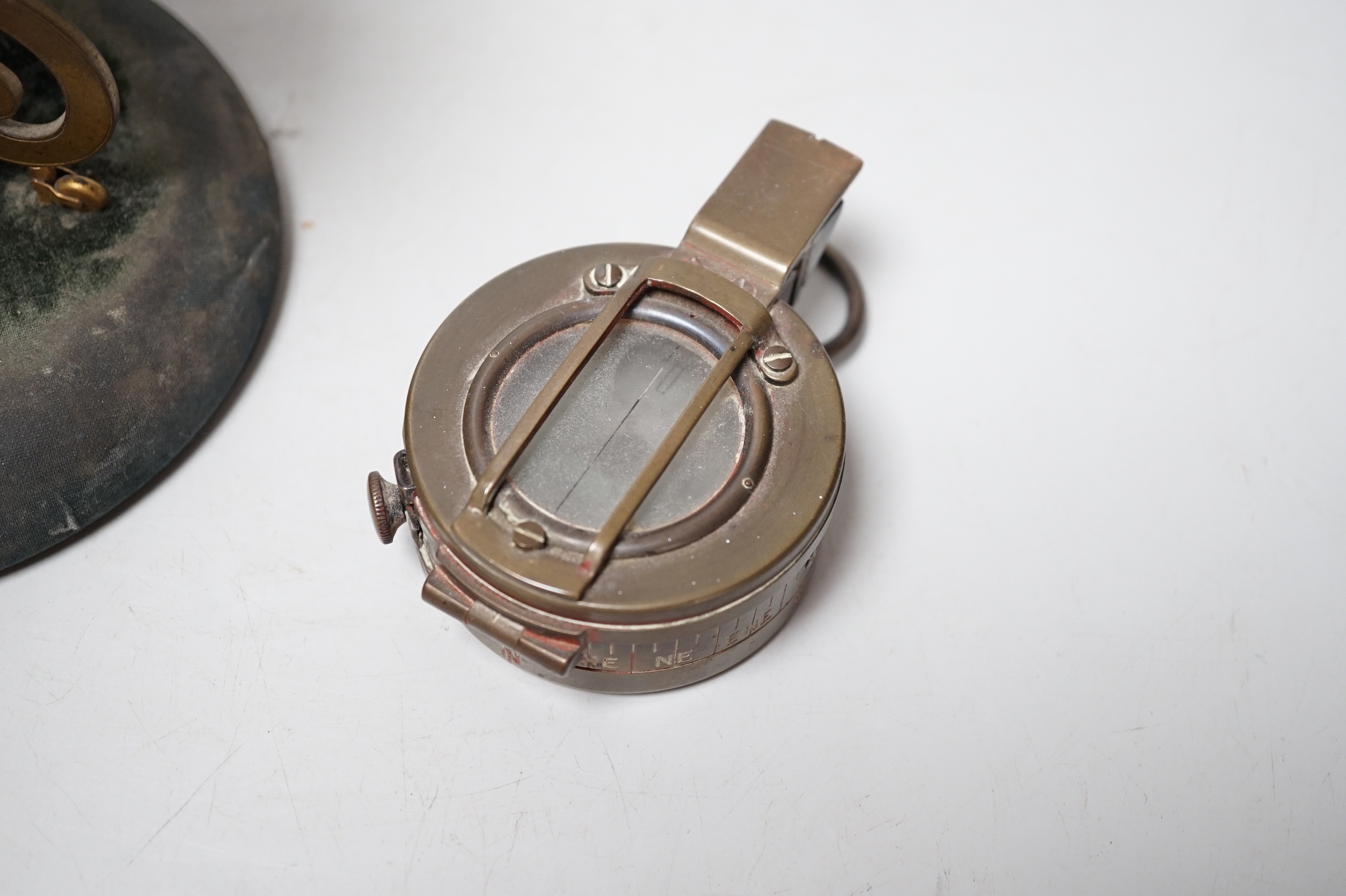 A Victorian Callaghan patent 'globe', desk barometer, thermometer and compass, 14cm high and a Sestrel compass